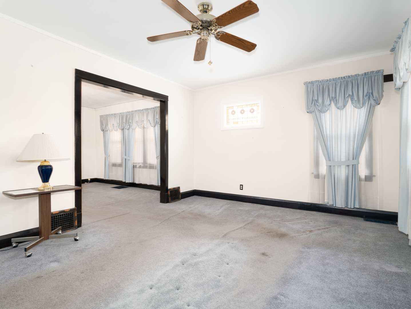 4949 West Deming Place Chicago, IL 60639 - Photo 3 of 18 a view of an empty room with a window