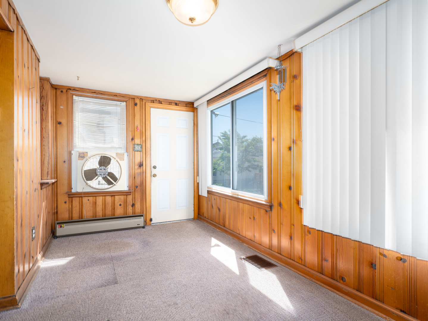 4949 West Deming Place Chicago, IL 60639 - Photo 7 of 18 a view of an empty room and window