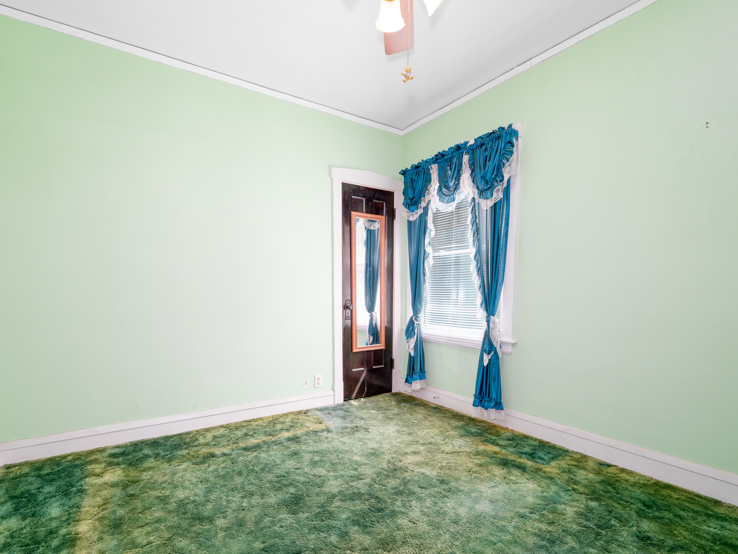 4949 West Deming Place Chicago, IL 60639 - Photo 9 of 18 a view of an empty room with closet and a window