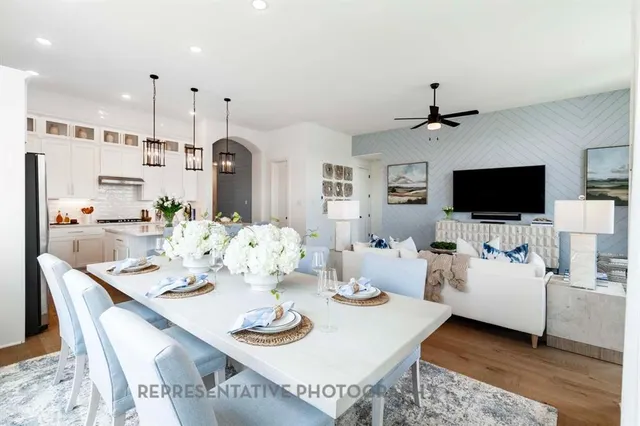 a view of a dining room with furniture