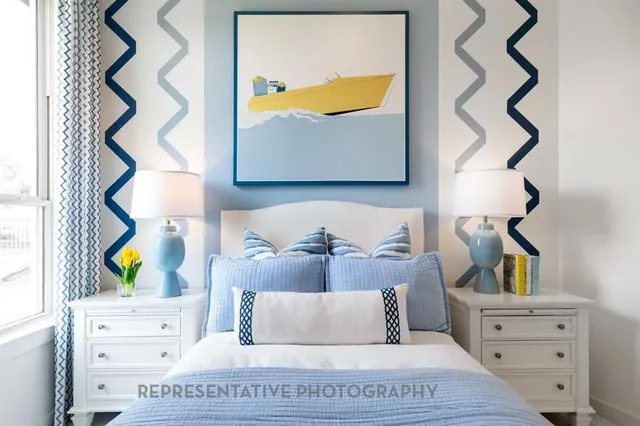 a living room with furniture and painting on the wall