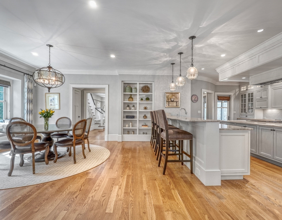 119 Lincoln Road Wayland, MA 01778 - Photo 13 of 40 a view of a dining room with furniture and wooden floor