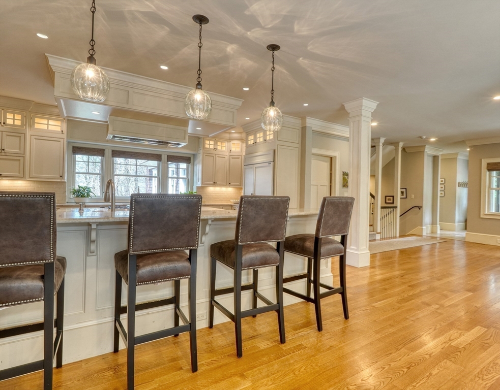 119 Lincoln Road Wayland, MA 01778 - Photo 14 of 40 a dining room with furniture and wooden floor