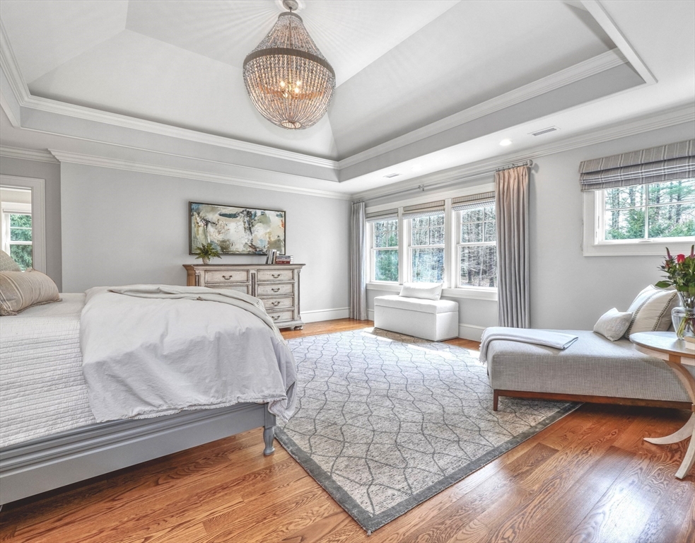 119 Lincoln Road Wayland, MA 01778 - Photo 20 of 40 a bedroom with a large bed and a large window