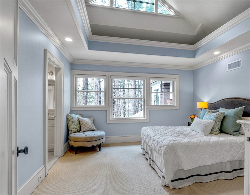 119 Lincoln Road Wayland, MA 01778 - Photo 23 of 40 a bedroom with a bed and a couch