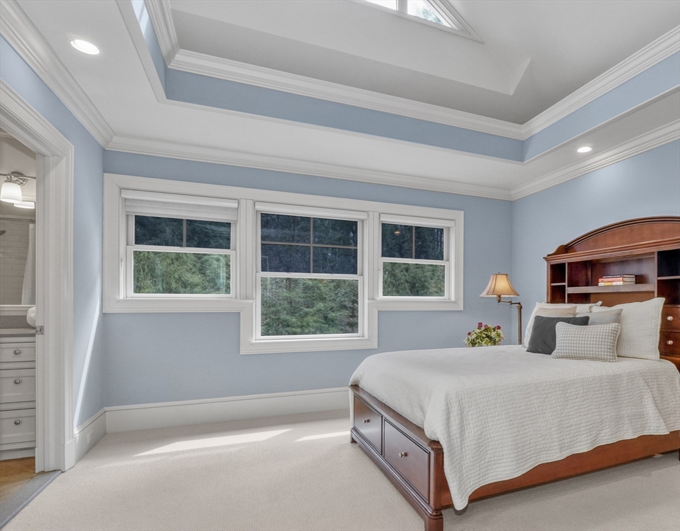 119 Lincoln Road Wayland, MA 01778 - Photo 27 of 40 a bedroom with a large bed and a window