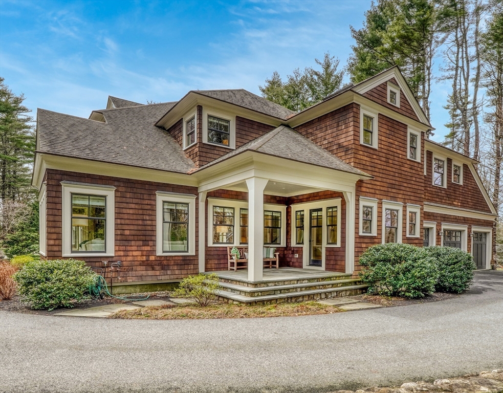 119 Lincoln Road Wayland, MA 01778 - Photo 32 of 40 front view of a house with a garden