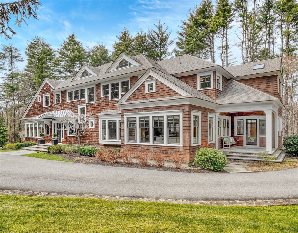 119 Lincoln Road Wayland, MA 01778 - Photo 40 of 40 a front view of a house with a yard