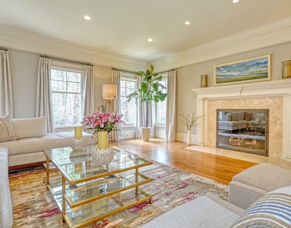 119 Lincoln Road Wayland, MA 01778 - Photo 4 of 40 a living room with furniture or dining room and a fireplace