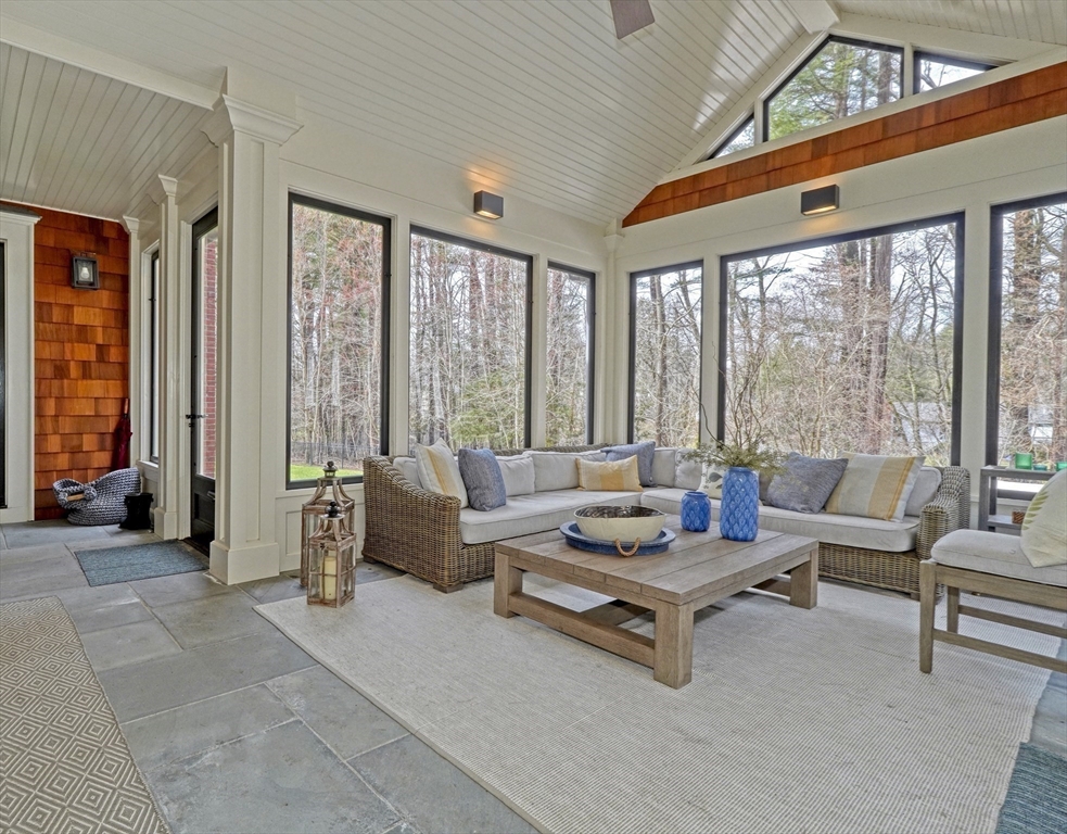 119 Lincoln Road Wayland, MA 01778 - Photo 9 of 40 a living room with furniture and large windows