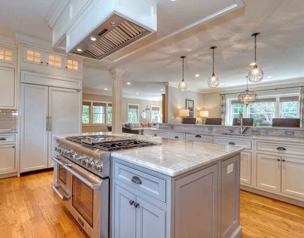 119 Lincoln Road Wayland, MA 01778 - Photo 10 of 40 a kitchen with a stove and a sink