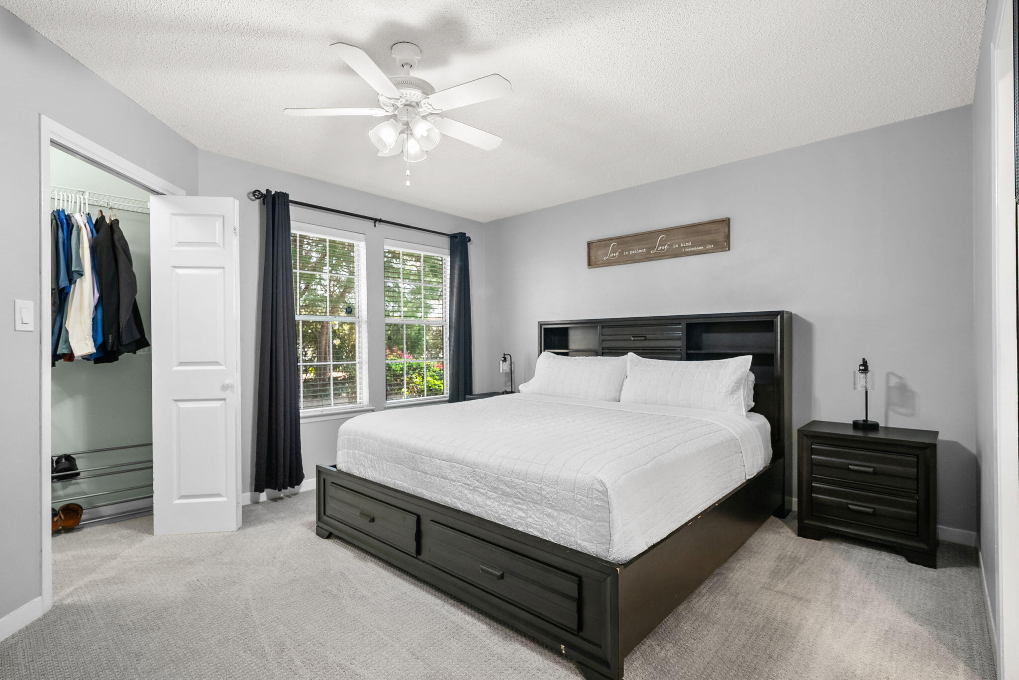 714 Putter Drive Niceville, FL 32578 - Photo 19 of 49 a large bed sitting in a bedroom next to a window