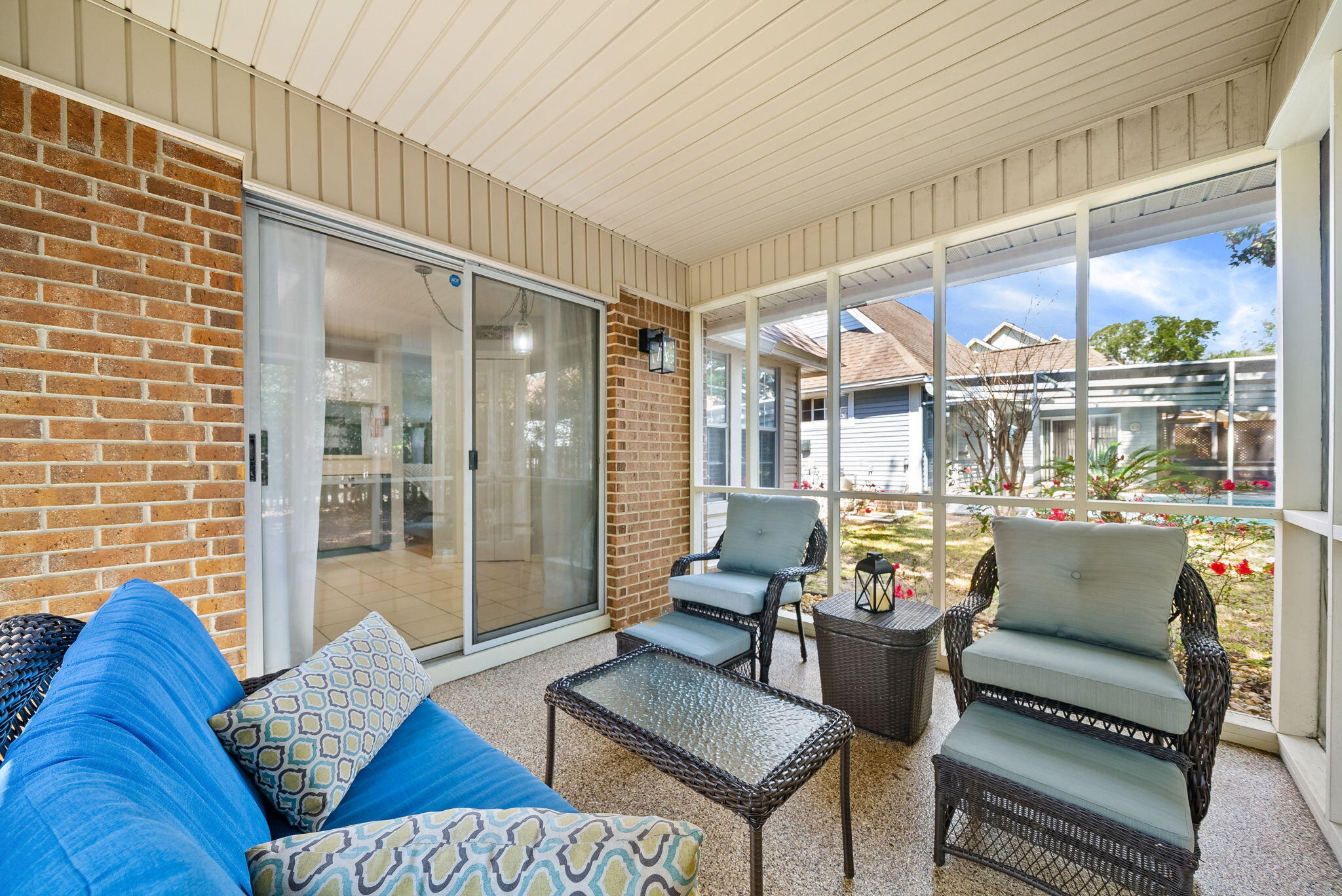 714 Putter Drive Niceville, FL 32578 - Photo 27 of 49 a living room with furniture and a floor to ceiling window
