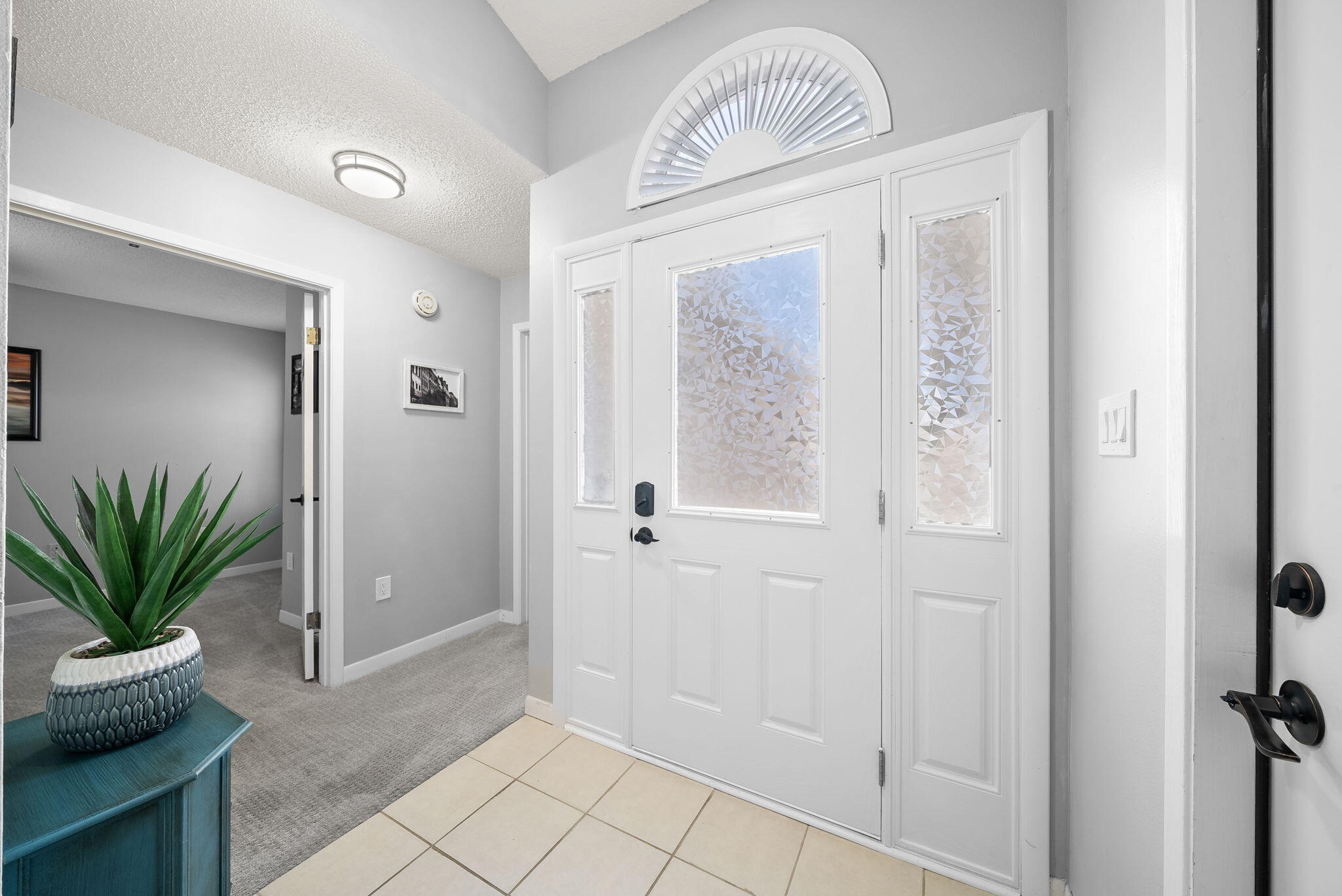 714 Putter Drive Niceville, FL 32578 - Photo 3 of 49 a view of entryway with wooden floor
