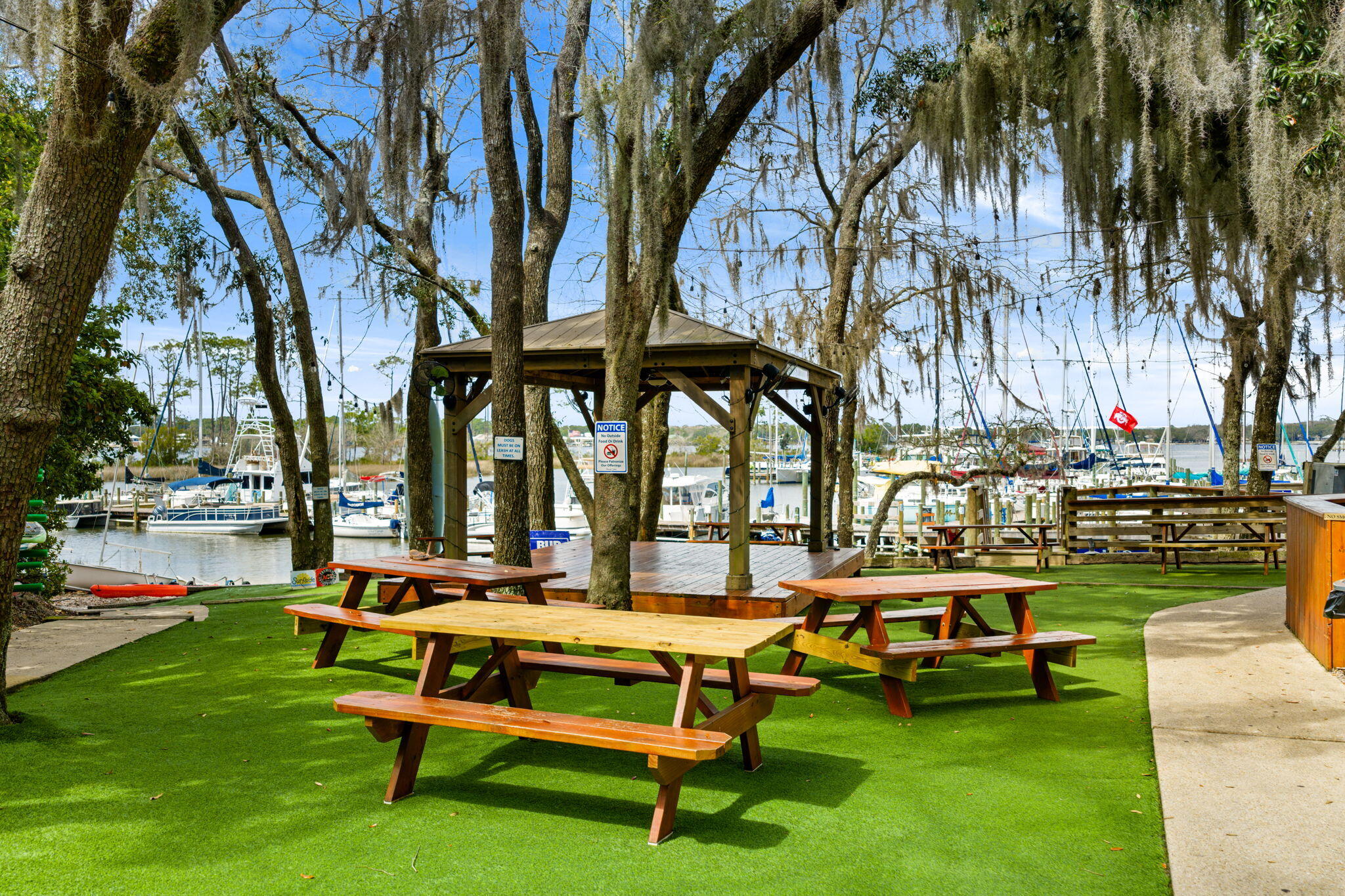 714 Putter Drive Niceville, FL 32578 - Photo 43 of 49 a view of swimming pool with outdoor seating and trees