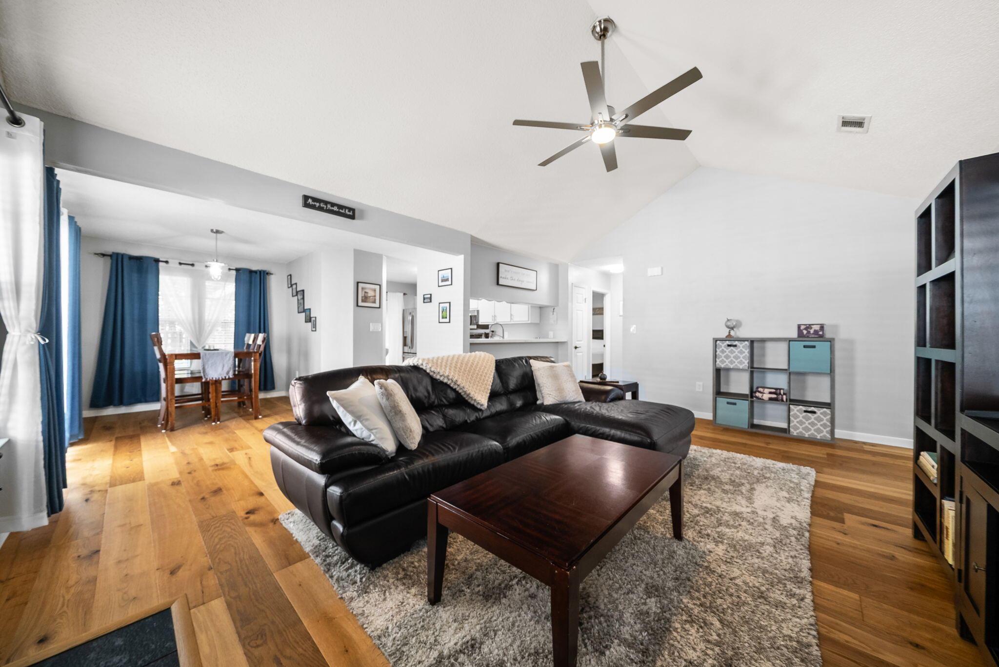 714 Putter Drive Niceville, FL 32578 - Photo 6 of 49 a living room with furniture and a wooden floor