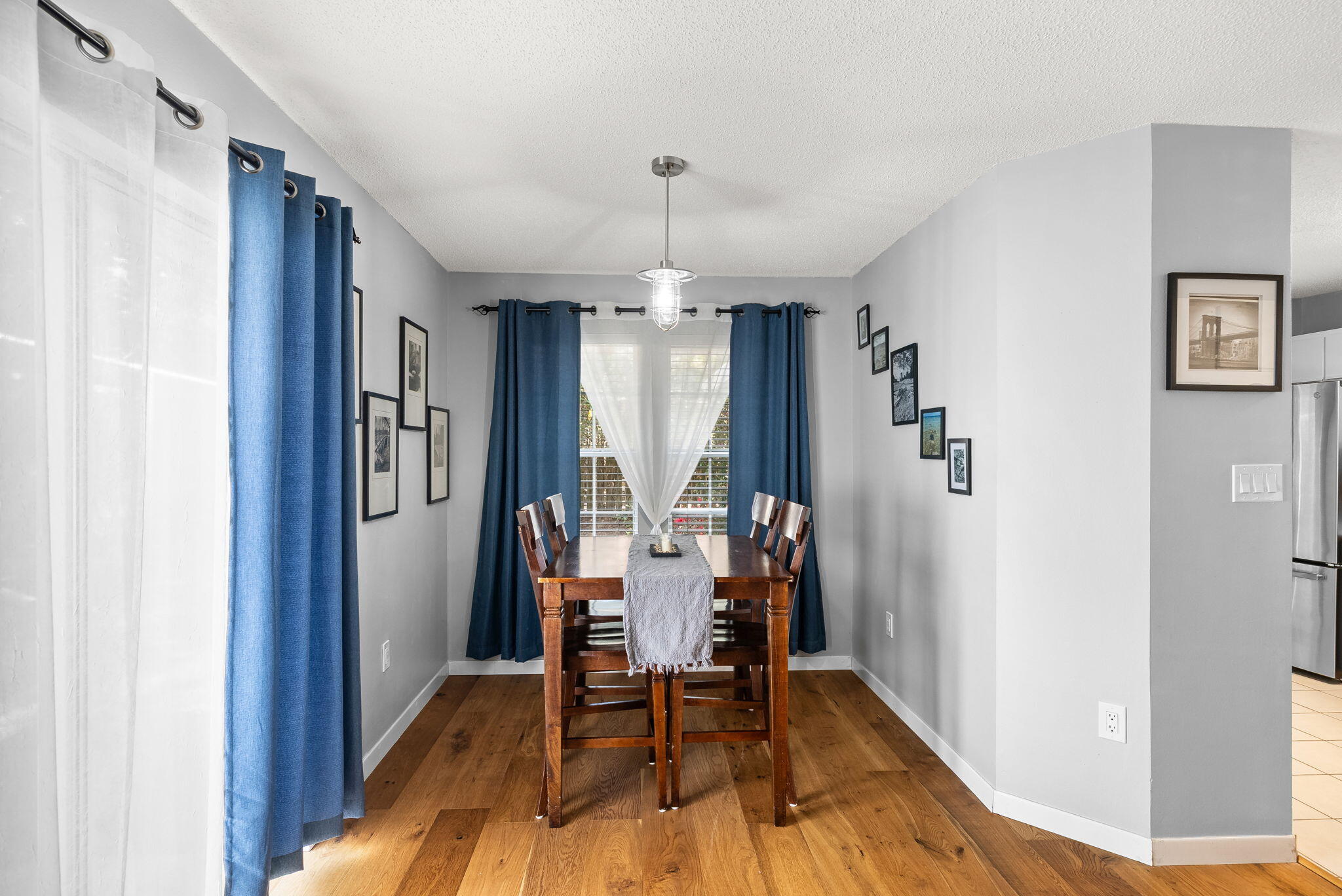 714 Putter Drive Niceville, FL 32578 - Photo 9 of 49 a dining room with furniture window and wooden floor