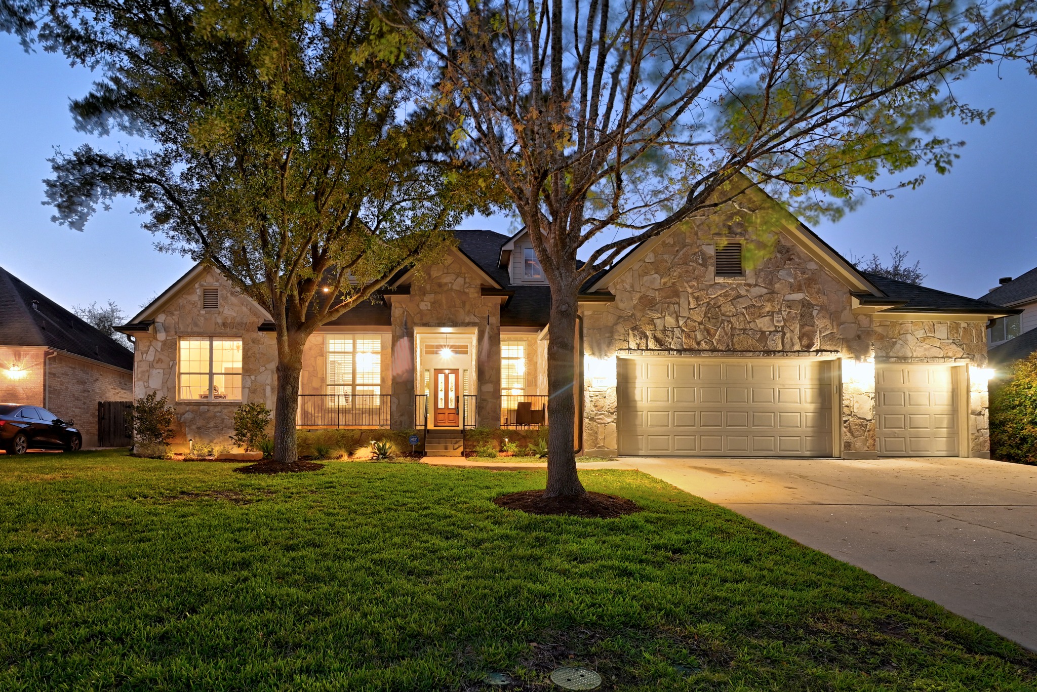 a front view of house with yard and green space