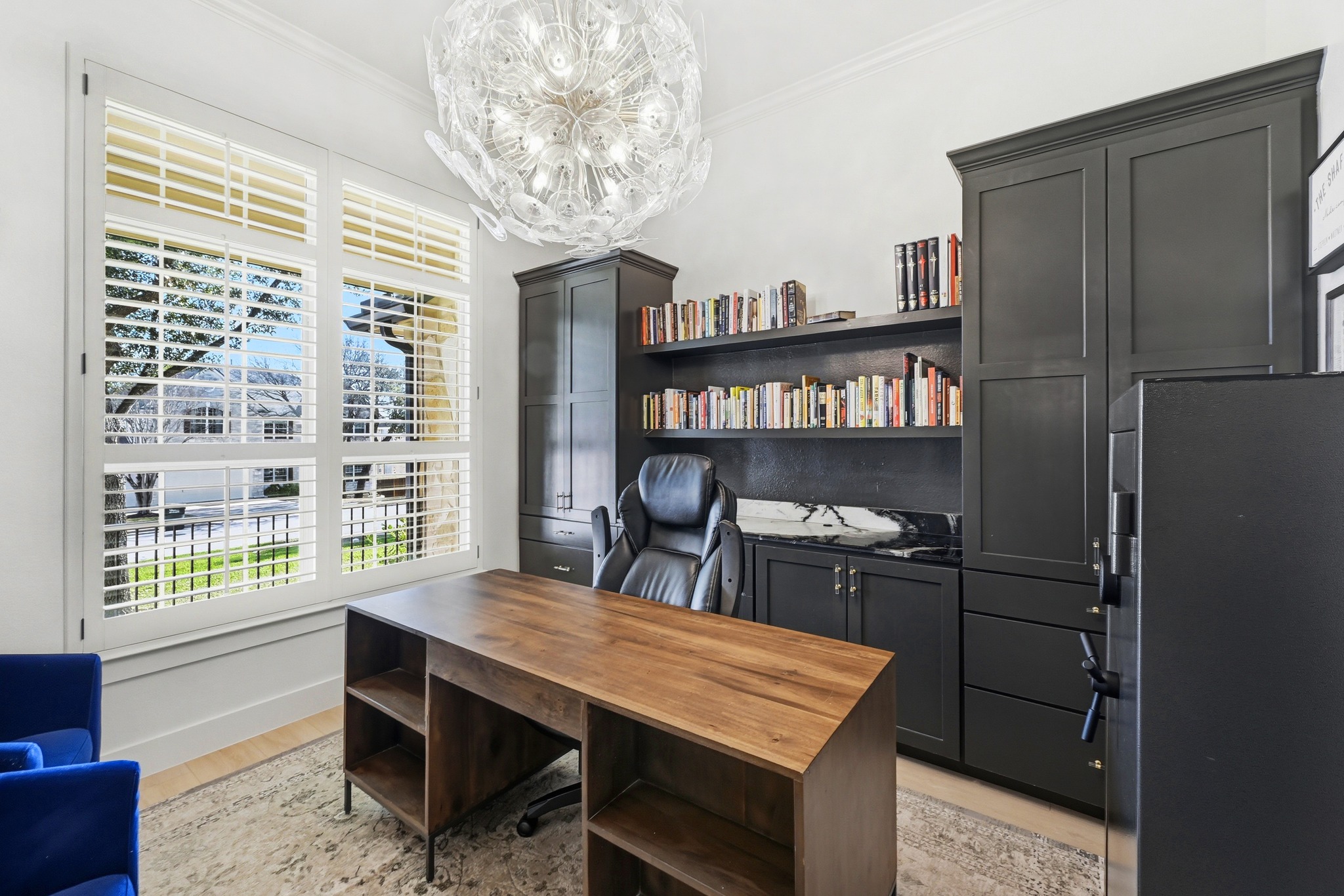 131 Eaton Lane Austin, TX 78737 - Photo 16 of 40 a view of a dining room with furniture window and wooden floor