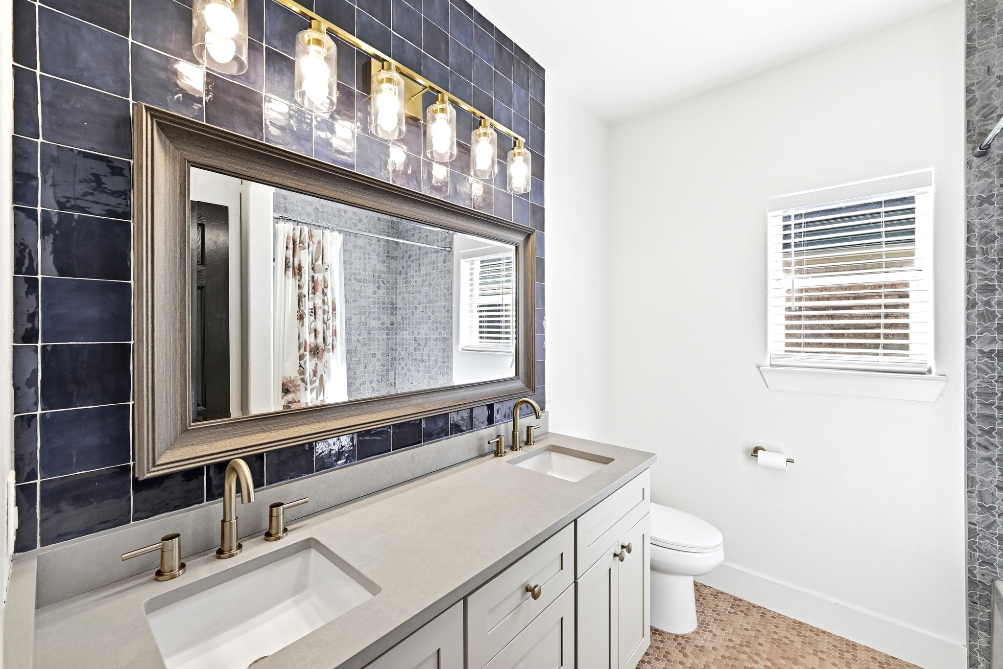 131 Eaton Lane Austin, TX 78737 - Photo 24 of 40 a bathroom with a sink and a toilet