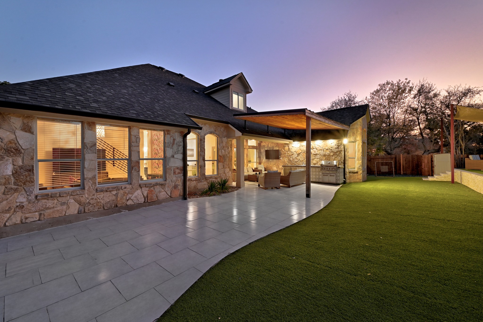 131 Eaton Lane Austin, TX 78737 - Photo 36 of 40 a view of a house with backyard and porch