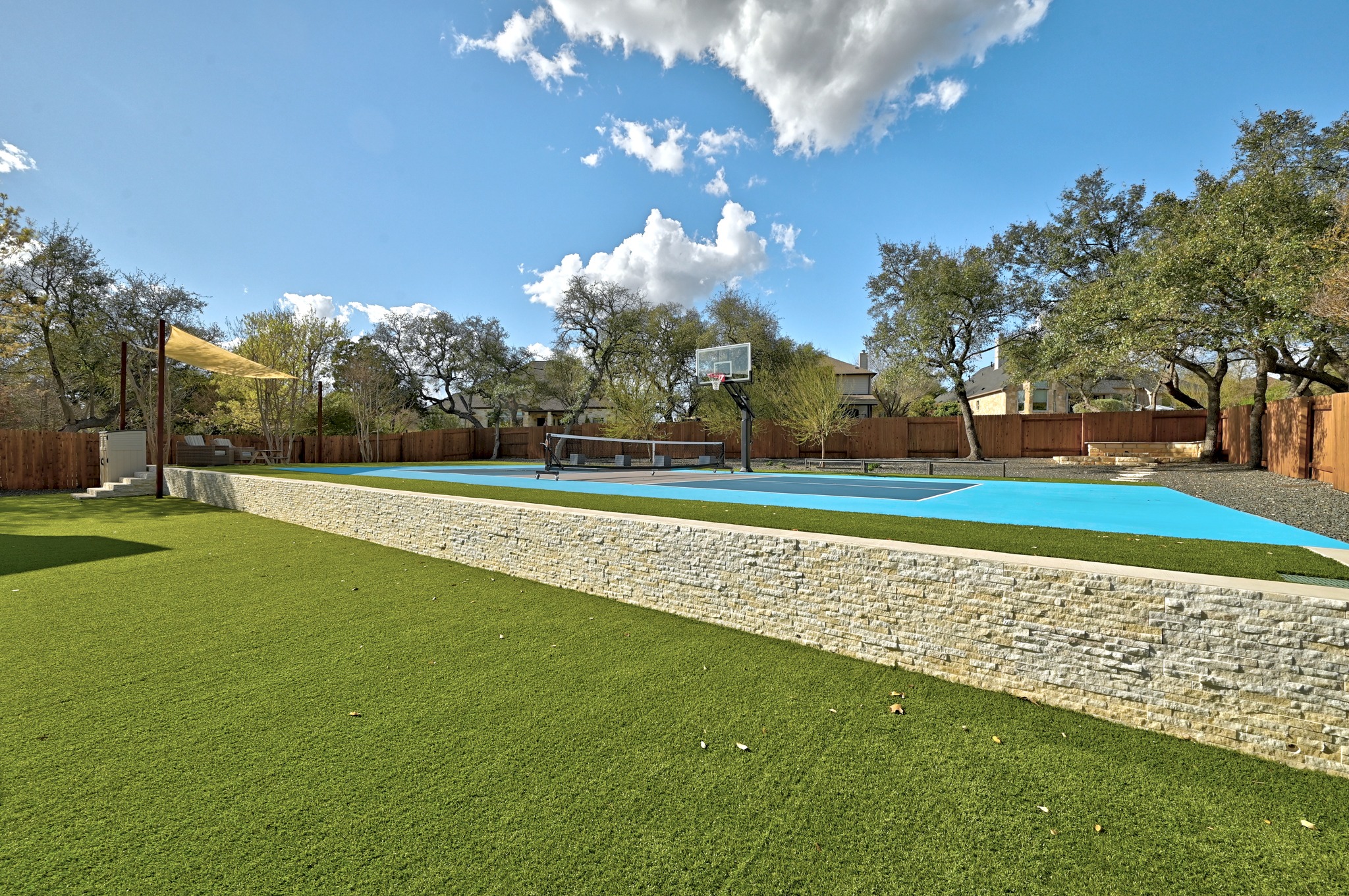 131 Eaton Lane Austin, TX 78737 - Photo 38 of 40 a view of a golf course with a lake