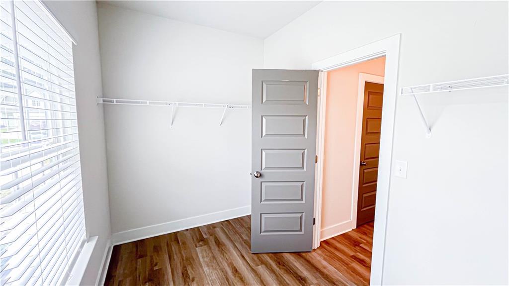 740 Eudora Welty Way Athens, GA 30607 - Photo 33 of 57 a view of walk in closet with empty racks