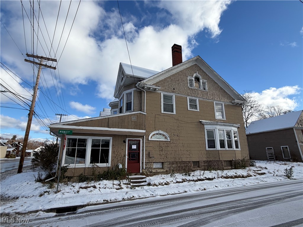 1020 West Prospect Road Ashtabula, OH 44004 - Photo 2 of 22 View of front of property with a chimney