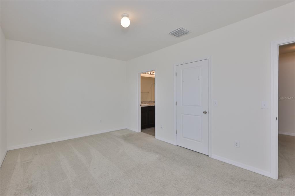 8969 Indigo Trail Loop Riverview, FL 33578 - Photo 25 of 41 a view of an empty room