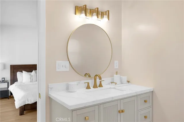 a bathroom with a sink and a mirror
