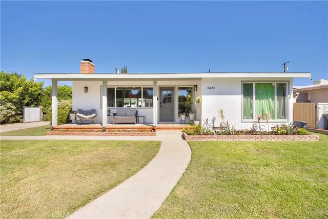 a view of swimming pool with outdoor seating