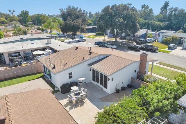 a view of a swimming pool with a patio