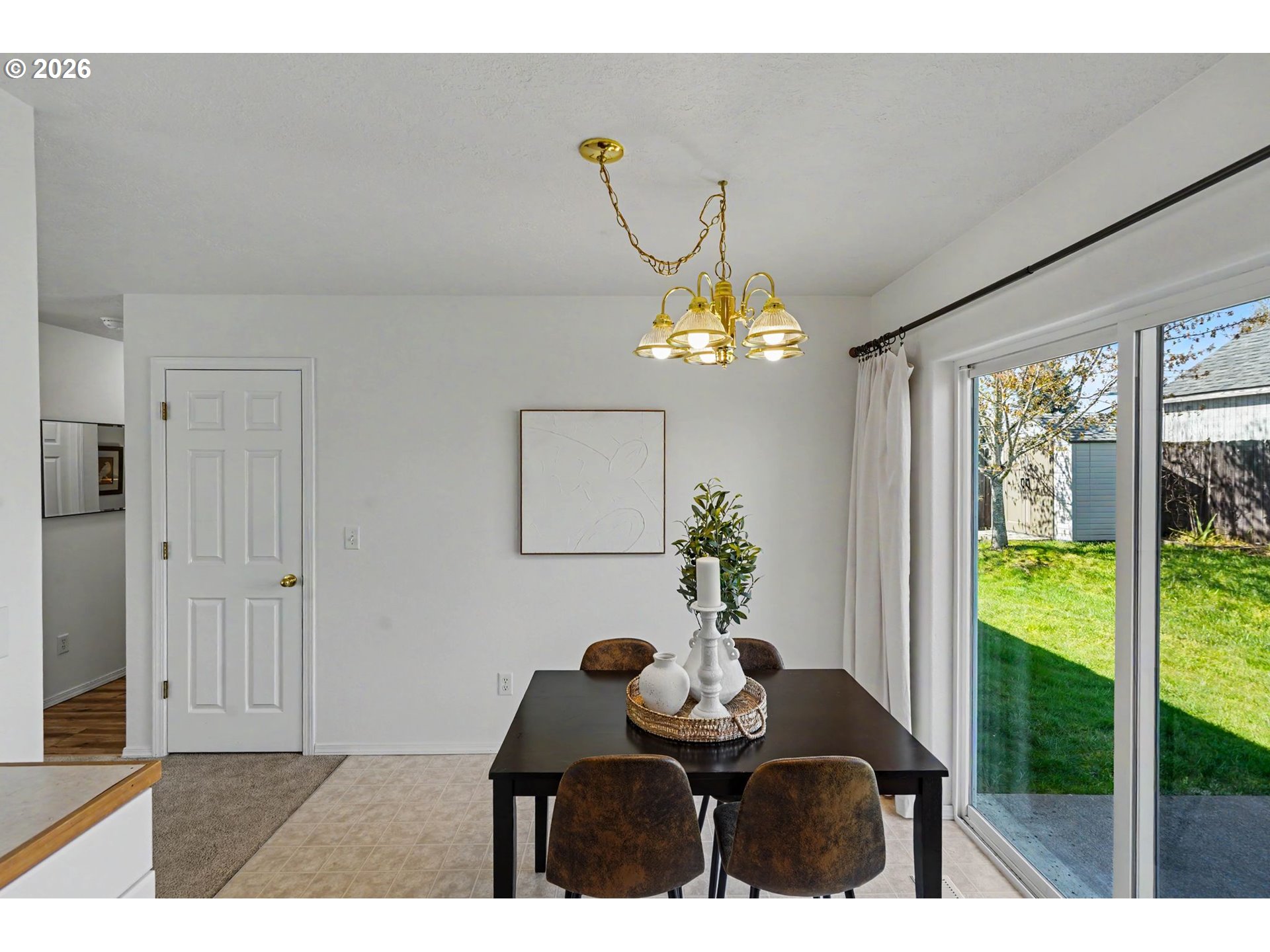 550 Southeast Hankel Street Dallas, OR 97338 - Photo 11 of 36 a dining room with furniture and chandelier