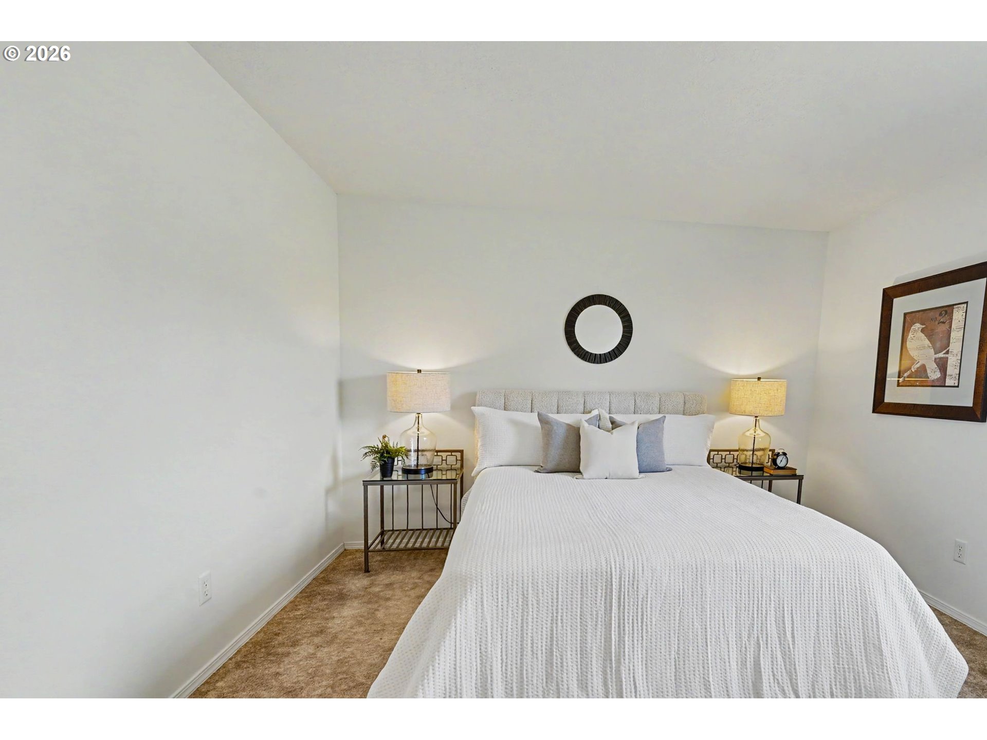 550 Southeast Hankel Street Dallas, OR 97338 - Photo 19 of 36 a bedroom with a bed and a lamp on dresser