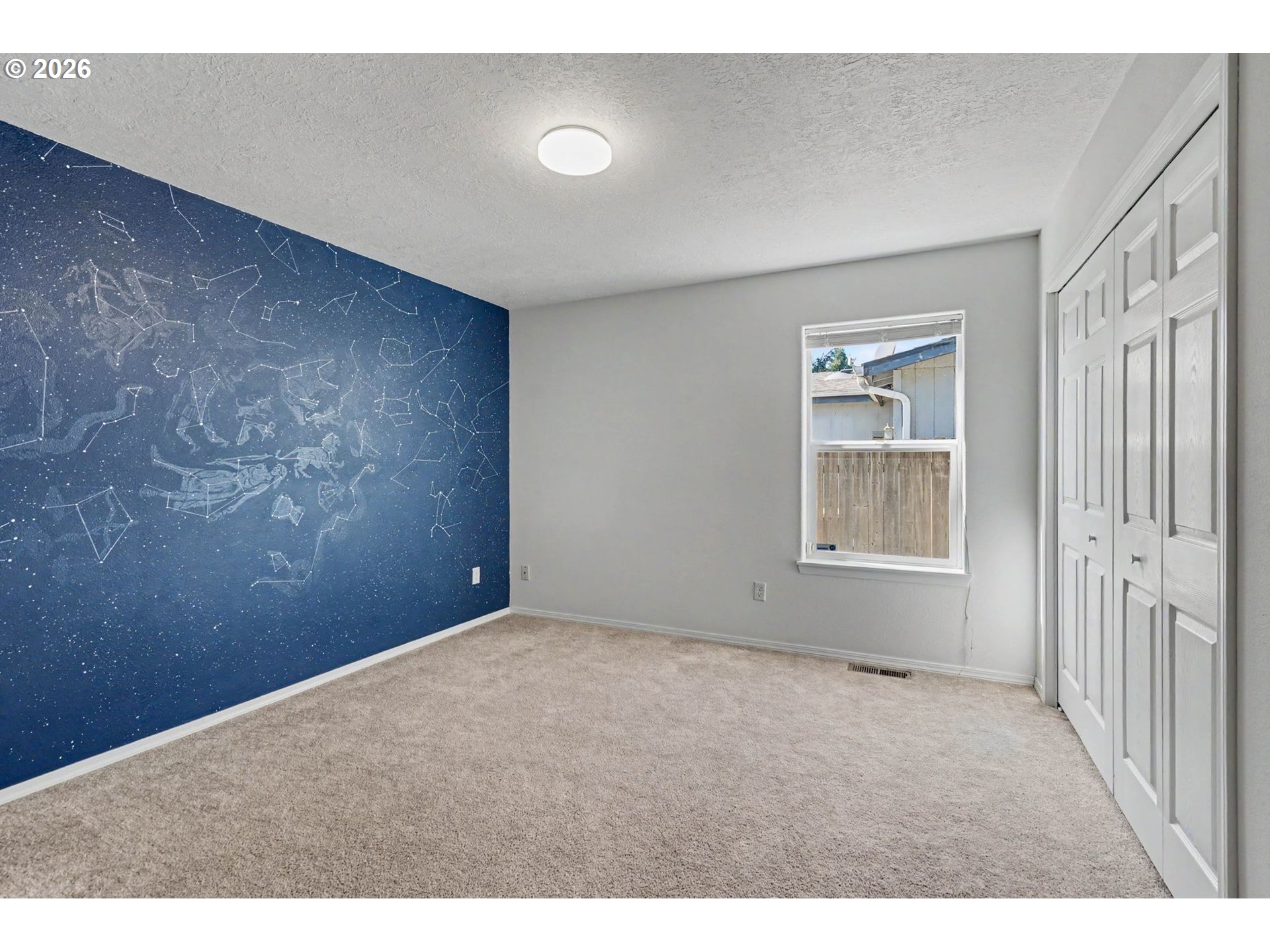 550 Southeast Hankel Street Dallas, OR 97338 - Photo 24 of 36 a view of an empty room with a window