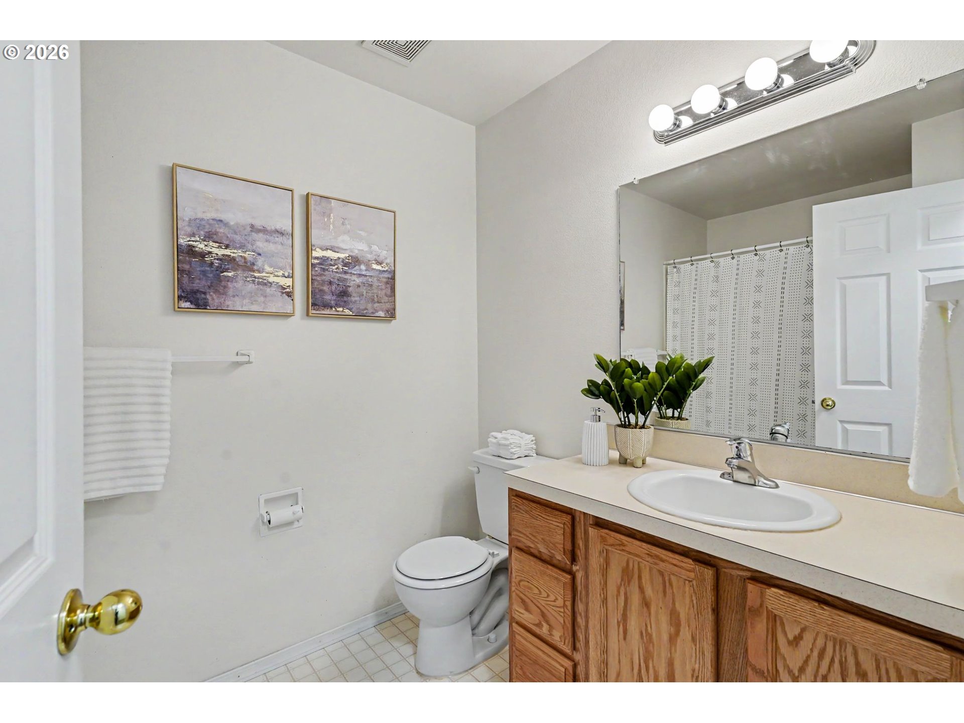 550 Southeast Hankel Street Dallas, OR 97338 - Photo 26 of 36 a bathroom with a granite countertop sink mirror and vanity
