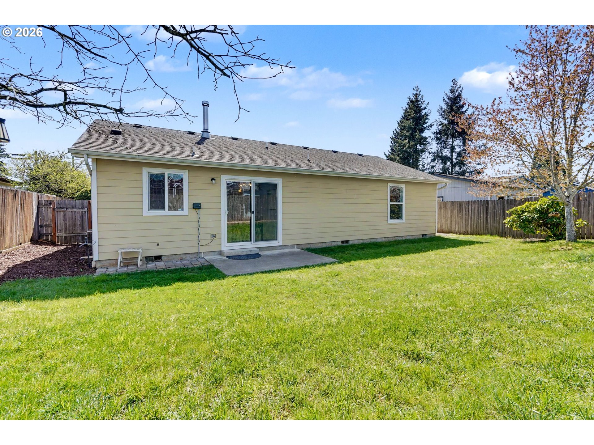 550 Southeast Hankel Street Dallas, OR 97338 - Photo 29 of 36 a view of a house with backyard and garden