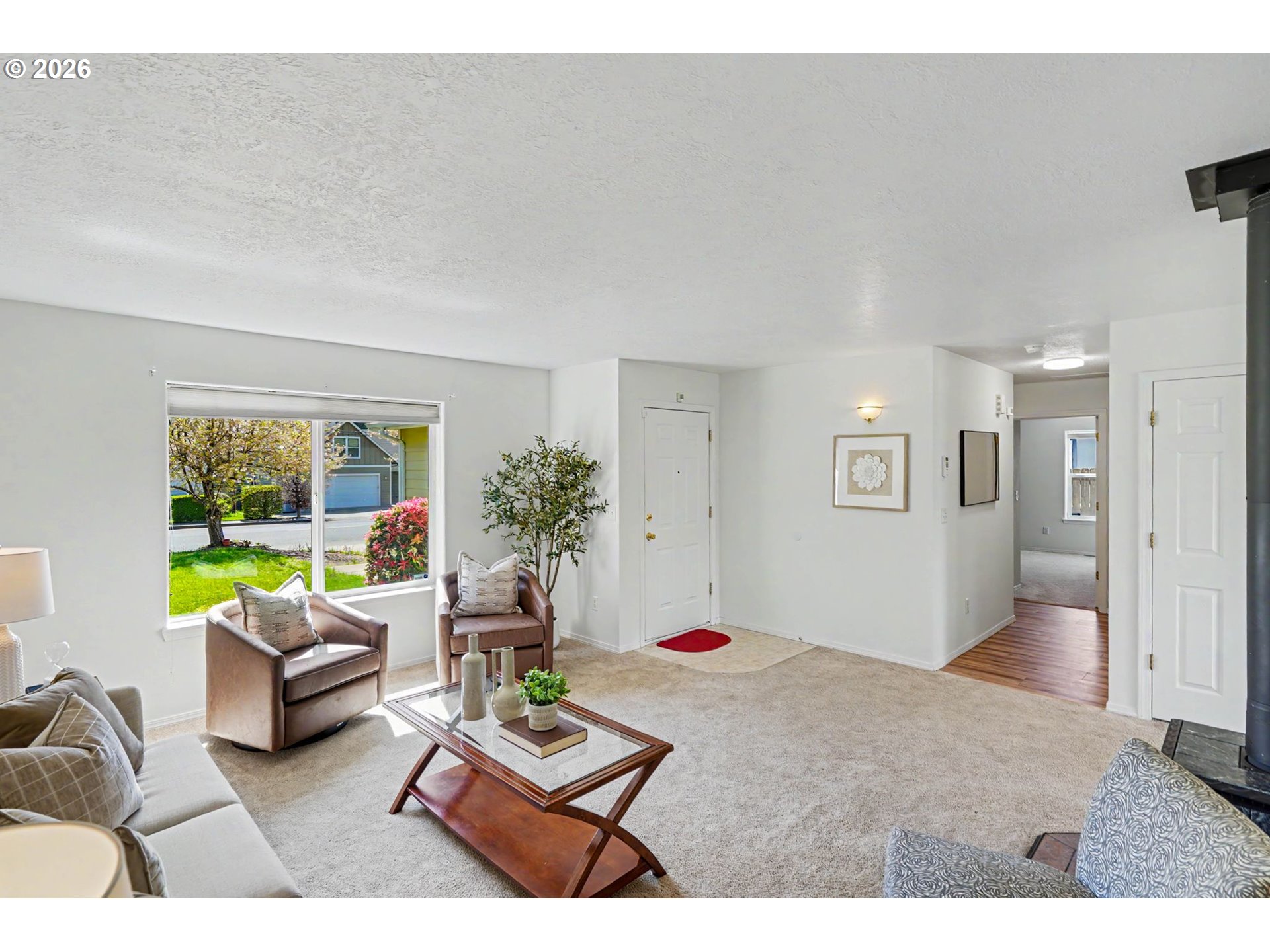550 Southeast Hankel Street Dallas, OR 97338 - Photo 8 of 36 a living room with furniture and a table