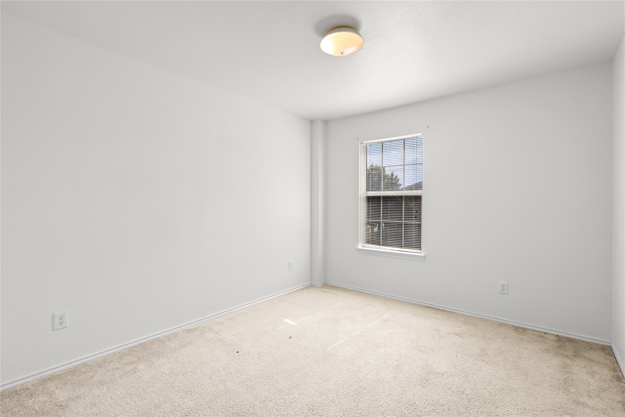 20806 Baronsledge Lane Katy, TX 77449 - Photo 13 of 23 an empty room with a window