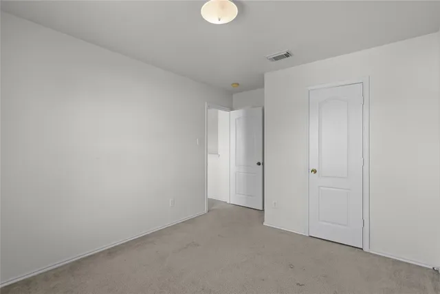 a bathroom with a sink toilet and a mirror