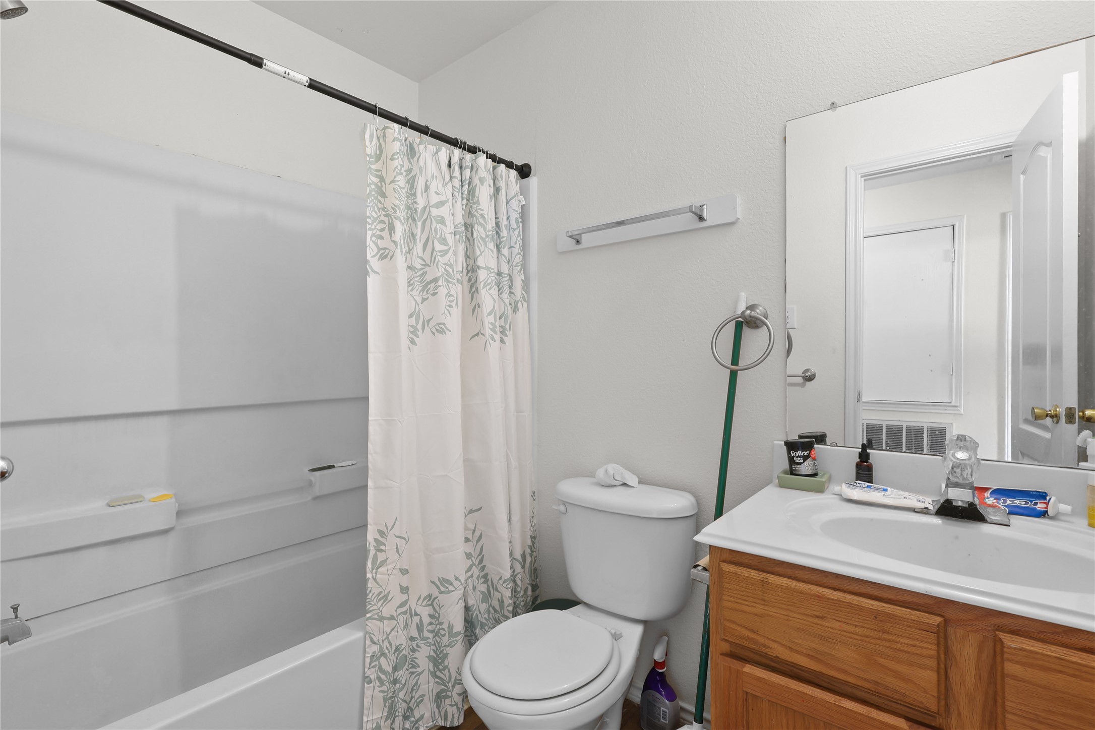 20806 Baronsledge Lane Katy, TX 77449 - Photo 16 of 23 a bathroom with a sink a toilet and shower