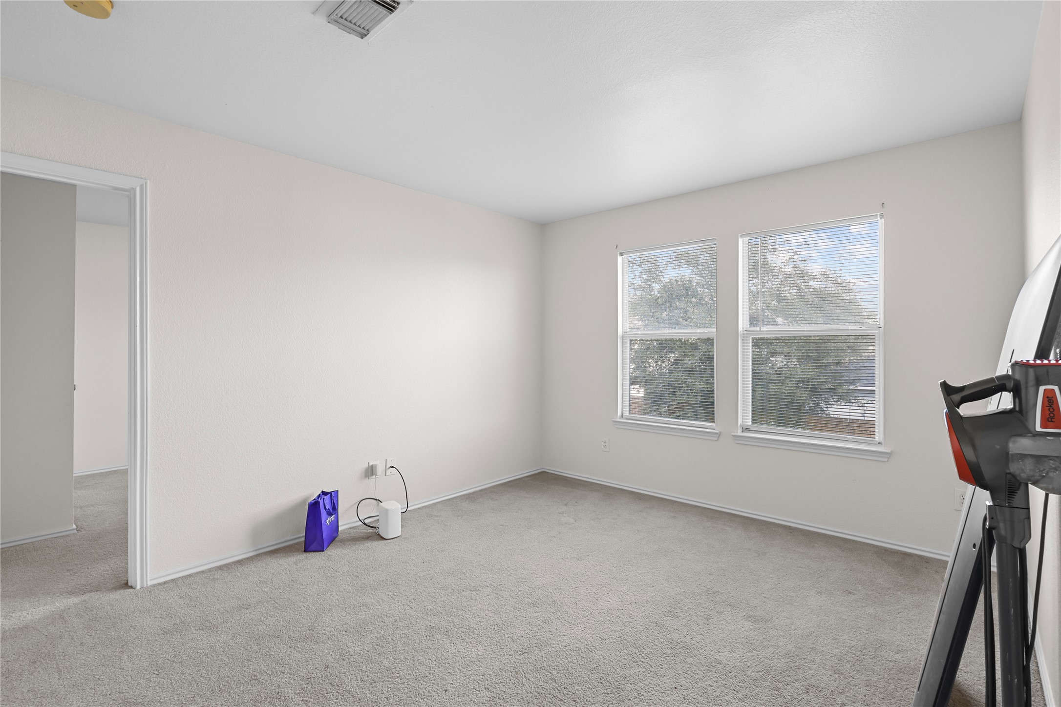 20806 Baronsledge Lane Katy, TX 77449 - Photo 17 of 23 an empty room with windows