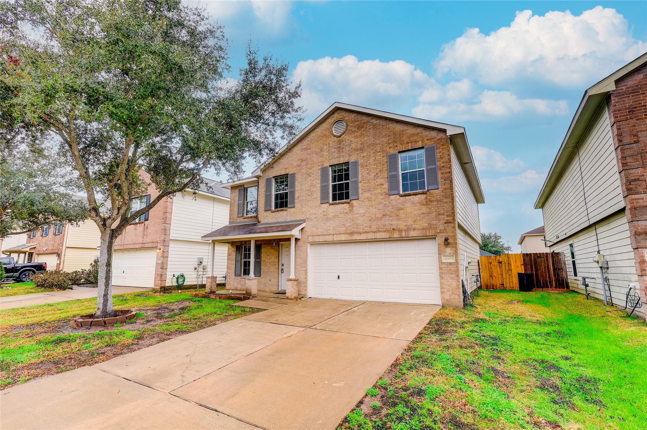 20806 Baronsledge Lane Katy, TX 77449 - Photo 3 of 23 a front view of a house with a yard