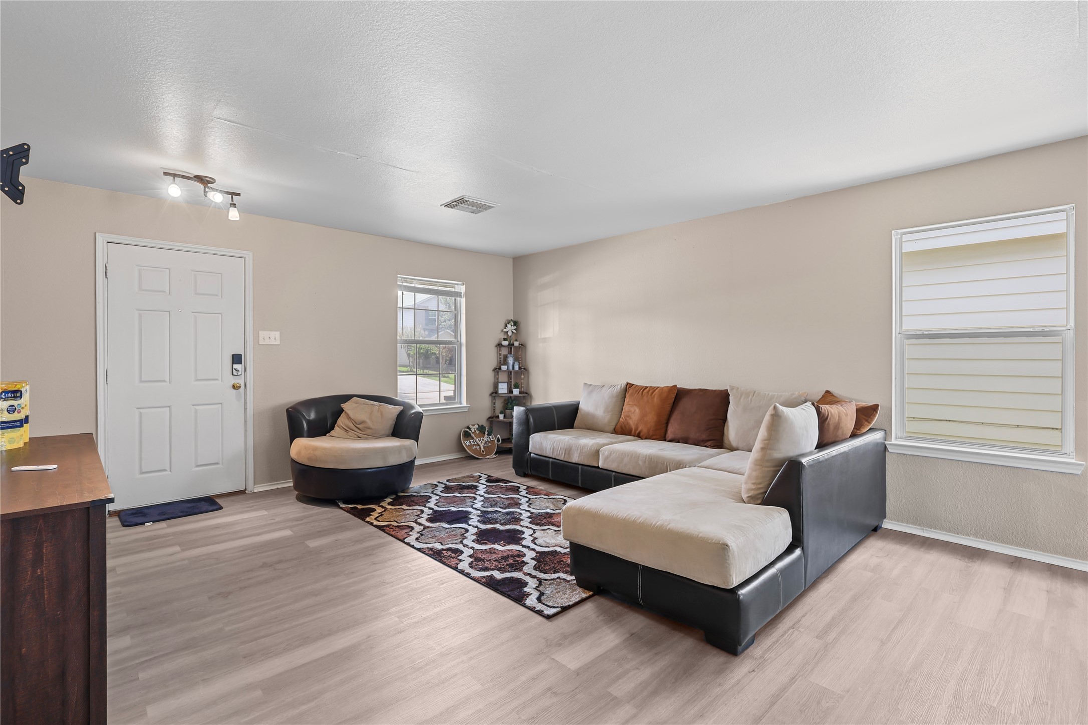 20806 Baronsledge Lane Katy, TX 77449 - Photo 4 of 23 a living room with furniture and wooden floor