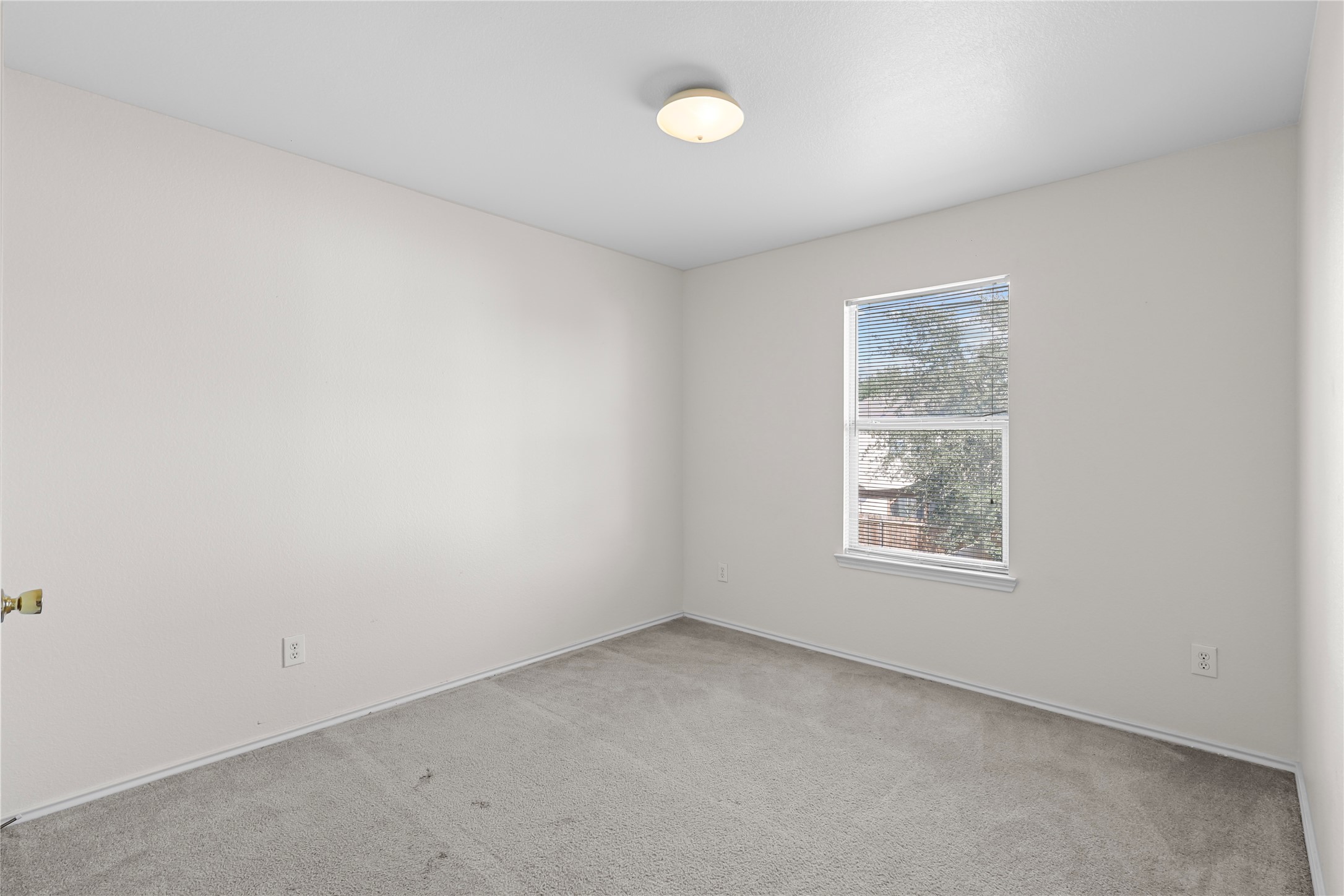 20806 Baronsledge Lane Katy, TX 77449 - Photo 9 of 23 an empty room with windows