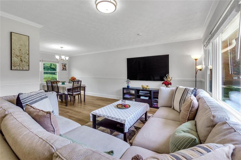 5800 Cedar Lane Southwest Mableton, GA 30126 - Photo 11 of 41 a living room with furniture and a flat screen tv