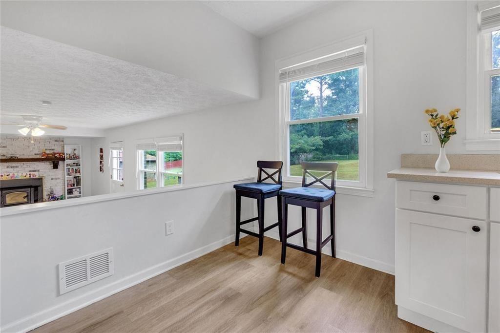 5800 Cedar Lane Southwest Mableton, GA 30126 - Photo 23 of 41 a view of a workspace with furniture and a window