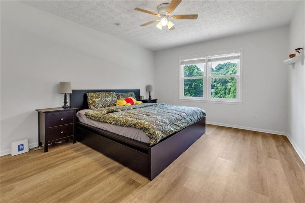 5800 Cedar Lane Southwest Mableton, GA 30126 - Photo 28 of 41 a bedroom with a bed and window