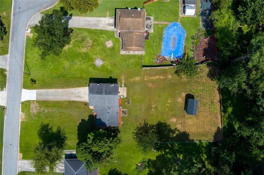 5800 Cedar Lane Southwest Mableton, GA 30126 - Photo 34 of 41 an aerial view of a house with a yard