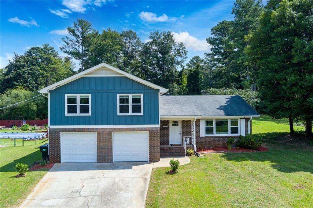 5800 Cedar Lane Southwest Mableton, GA 30126 - Photo 41 of 41 a front view of a house with a yard